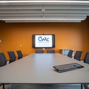 Boardroom with Logo on Screen